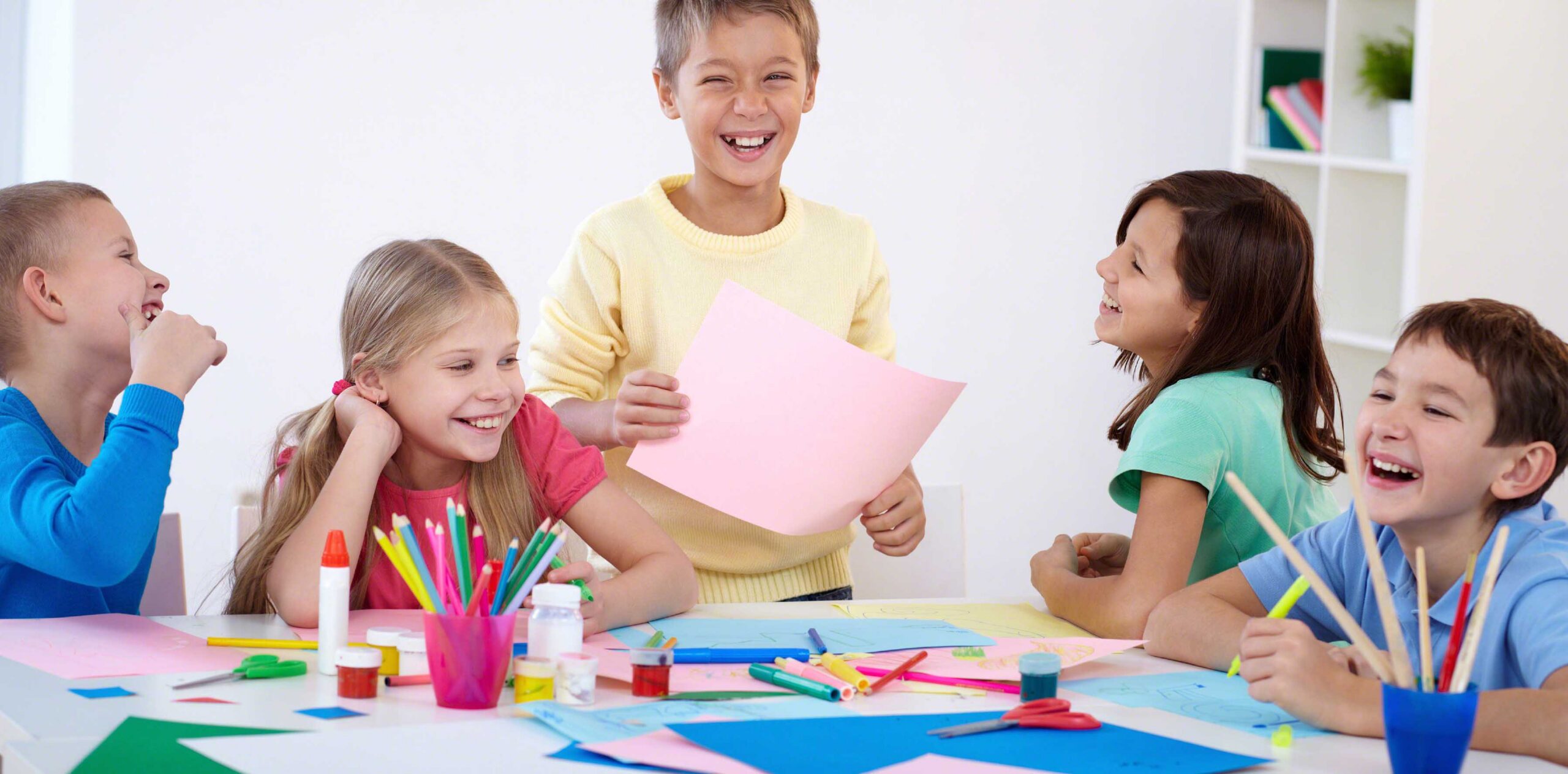 Children crafting during a babysitting course